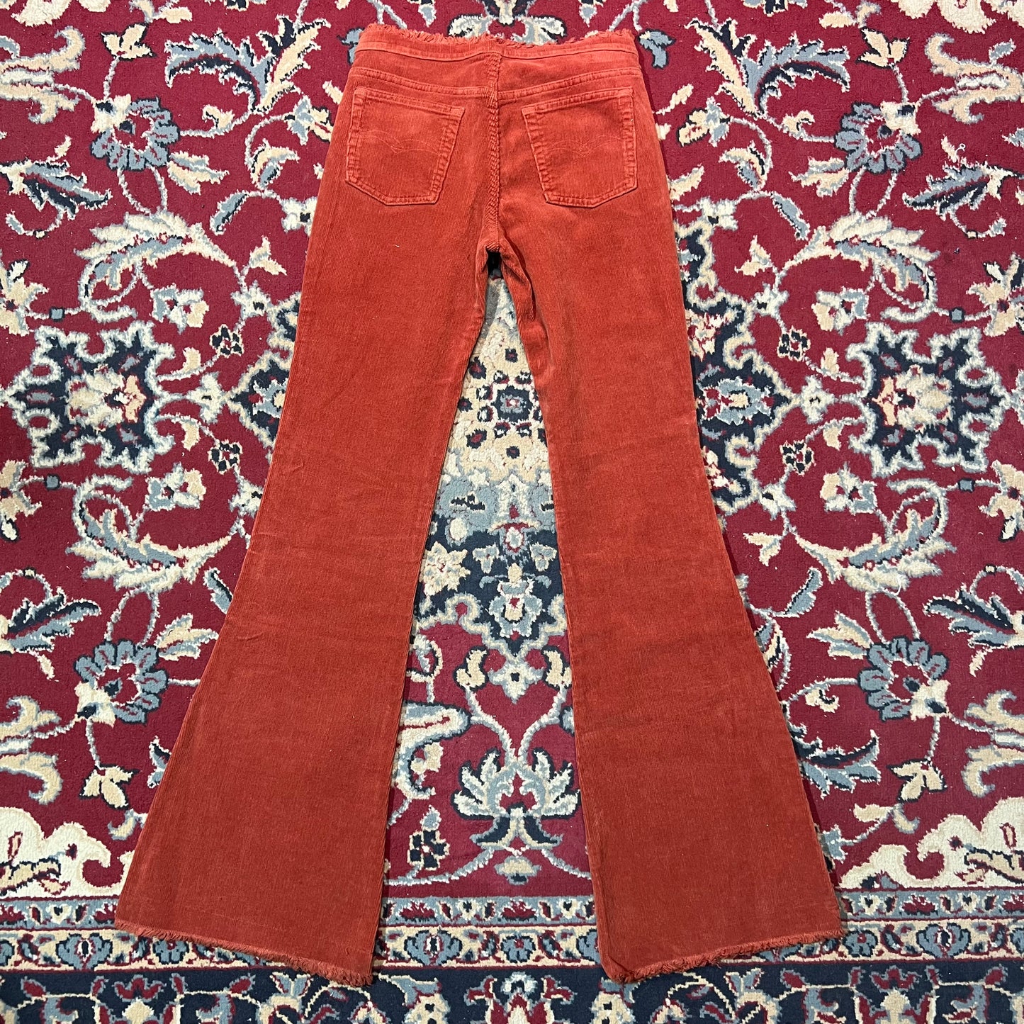 Pantaloni zampa a coste 44