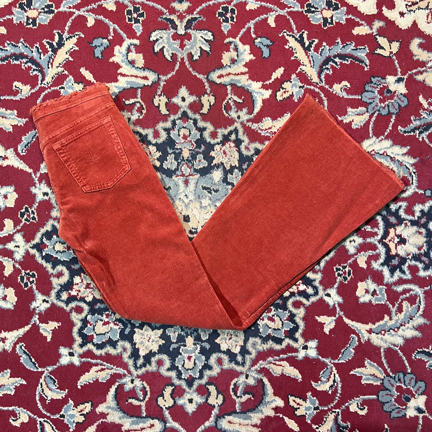 Pantaloni zampa a coste 44