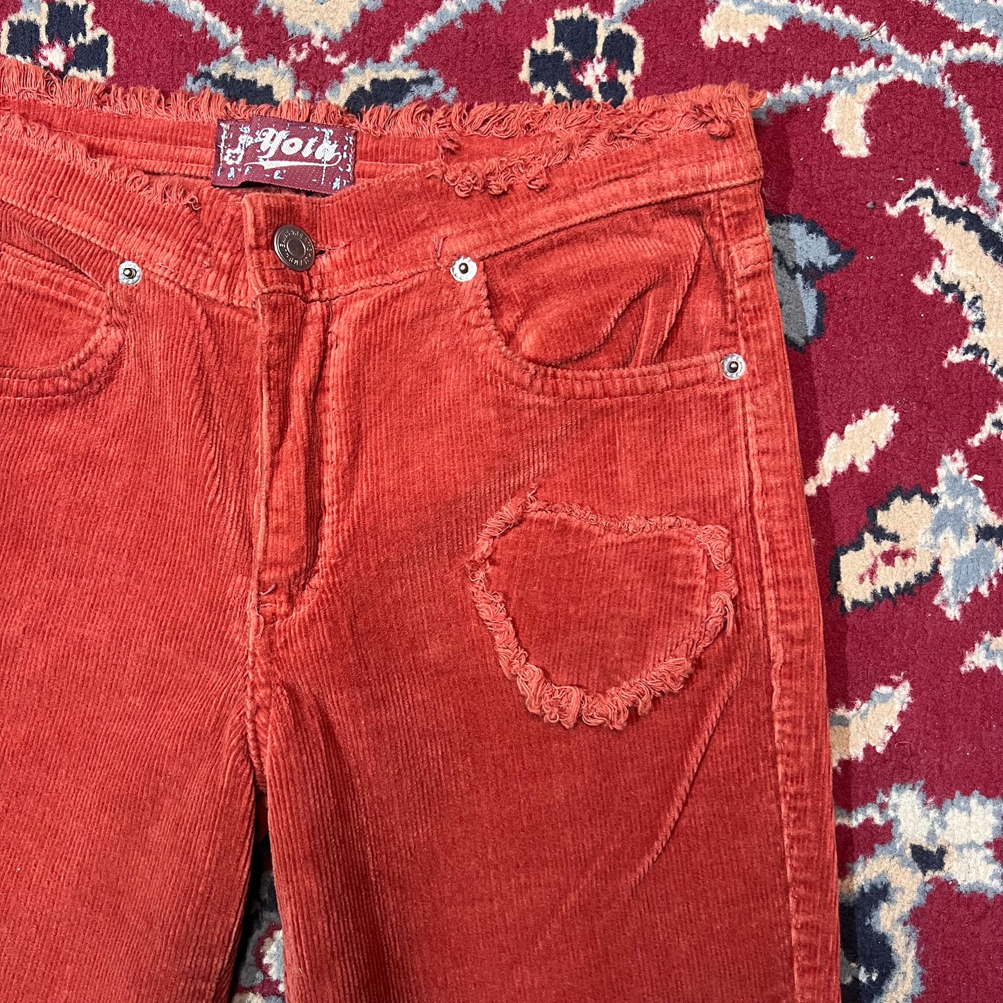 Pantaloni zampa a coste 44