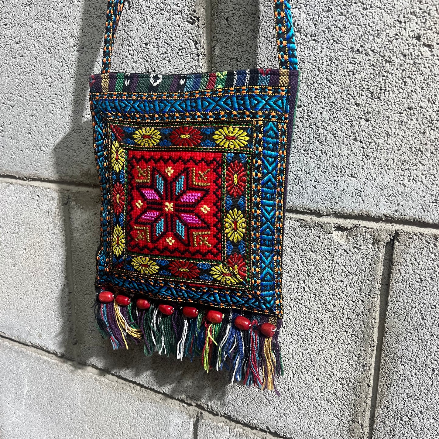 Tracolla frange
