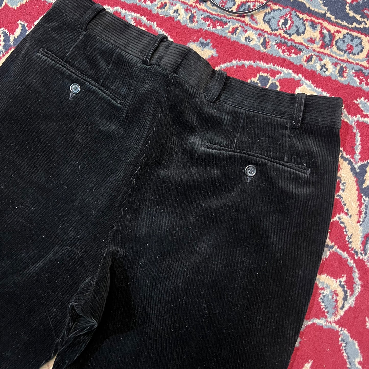 Pantaloni neri a coste 52
