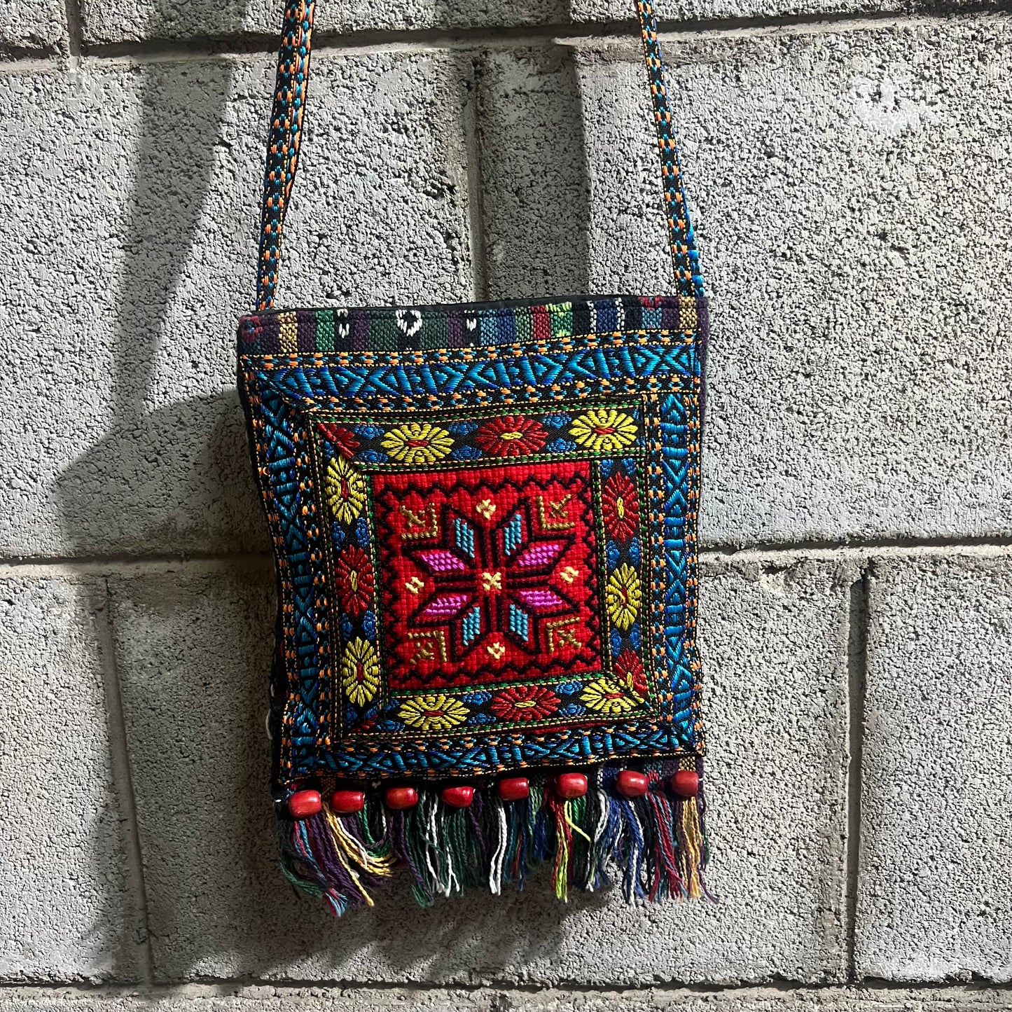 Tracolla frange