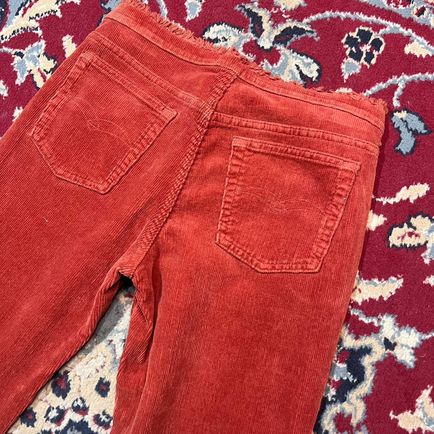 Pantaloni zampa a coste 44